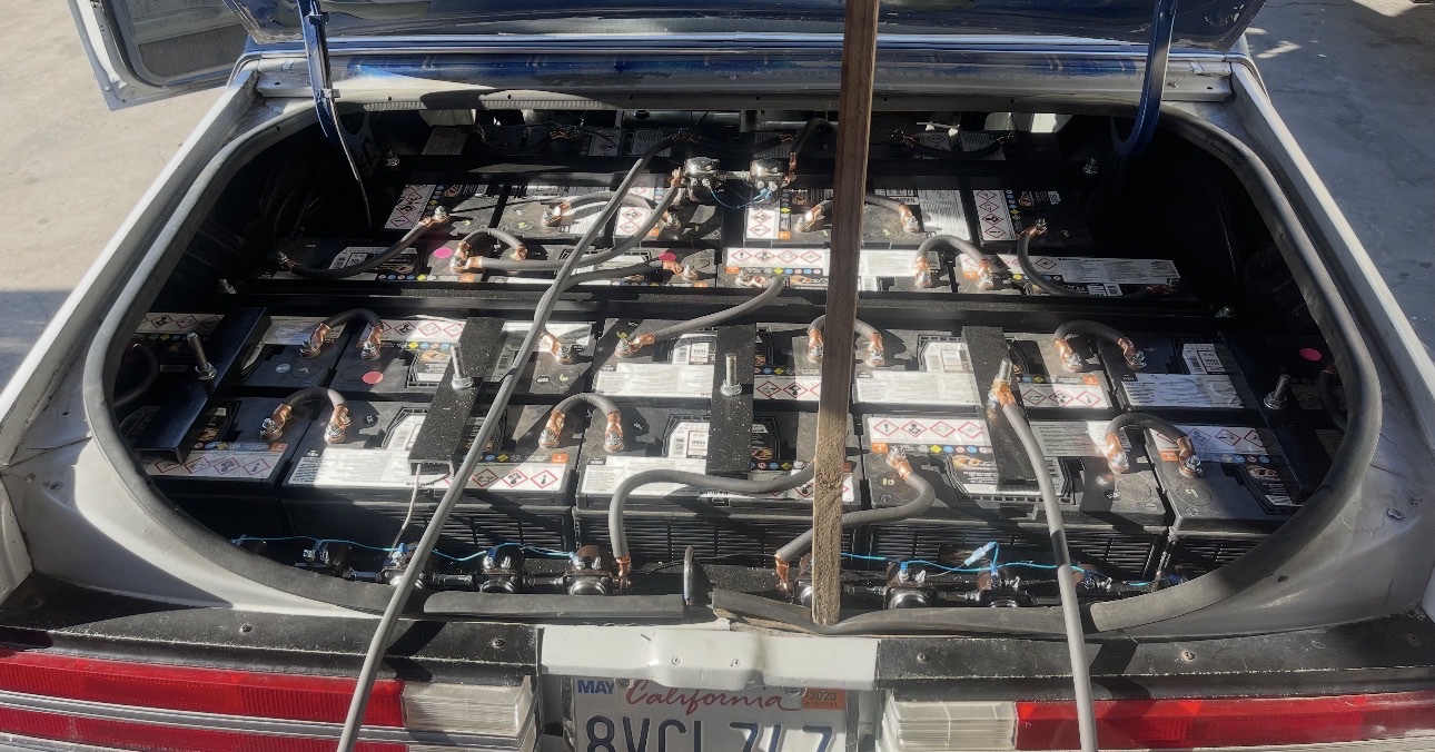 Lowrider trunk setup with black batteries