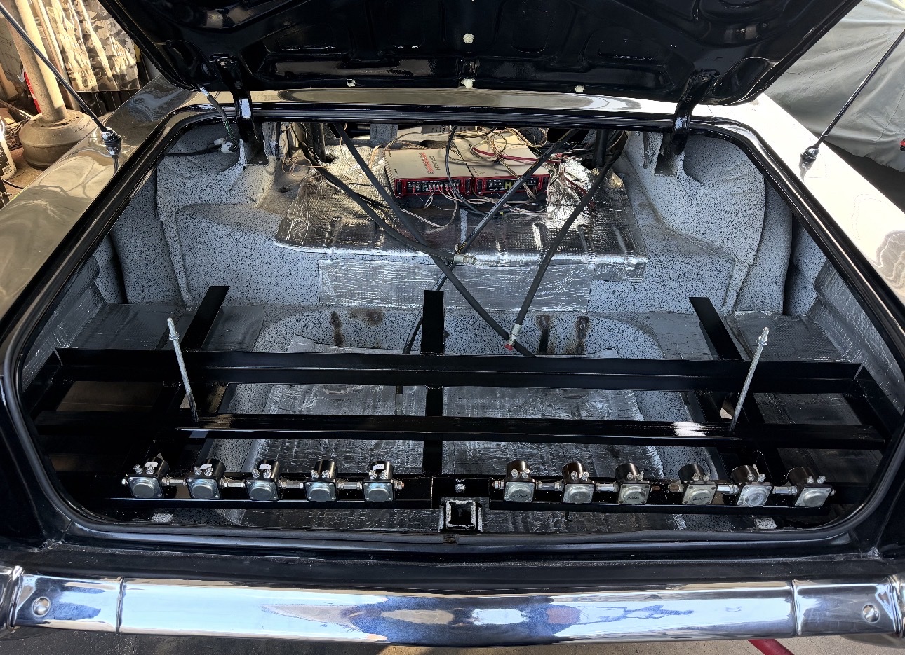 Frame support and hydraulic trunk work
