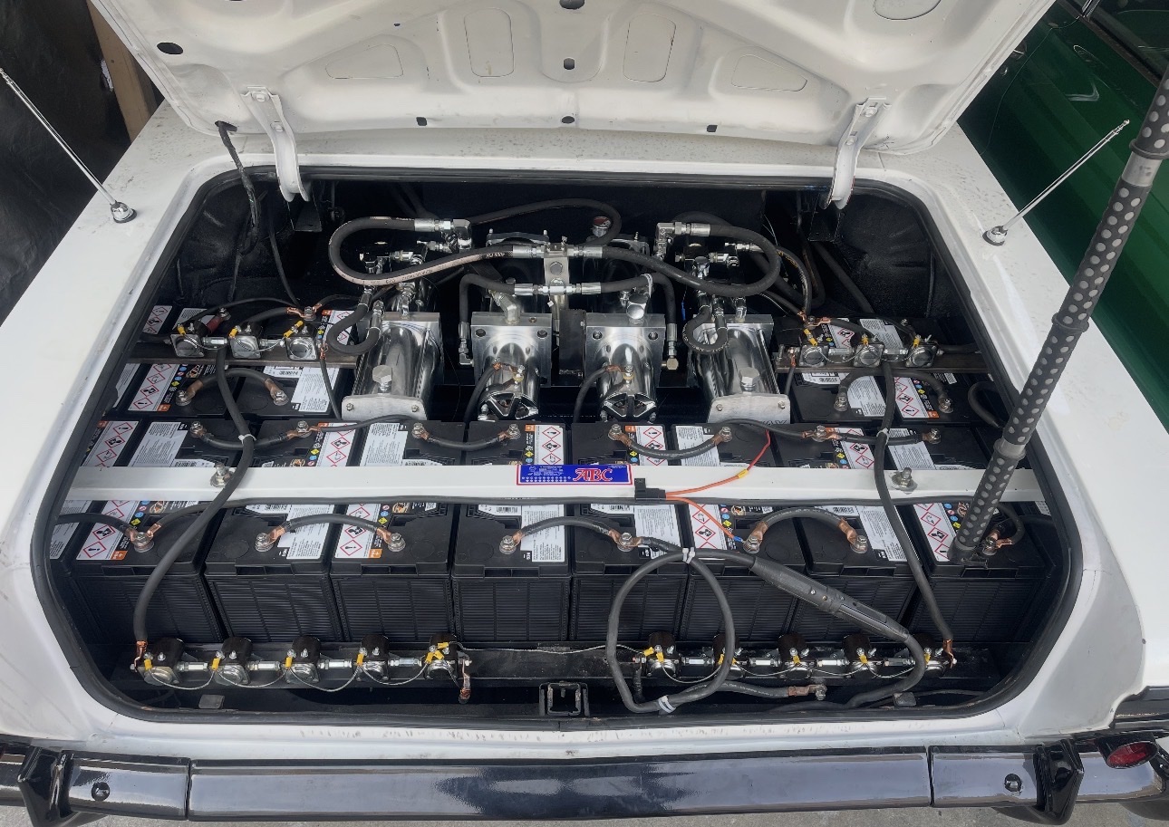 White car hydraulic trunk setup
