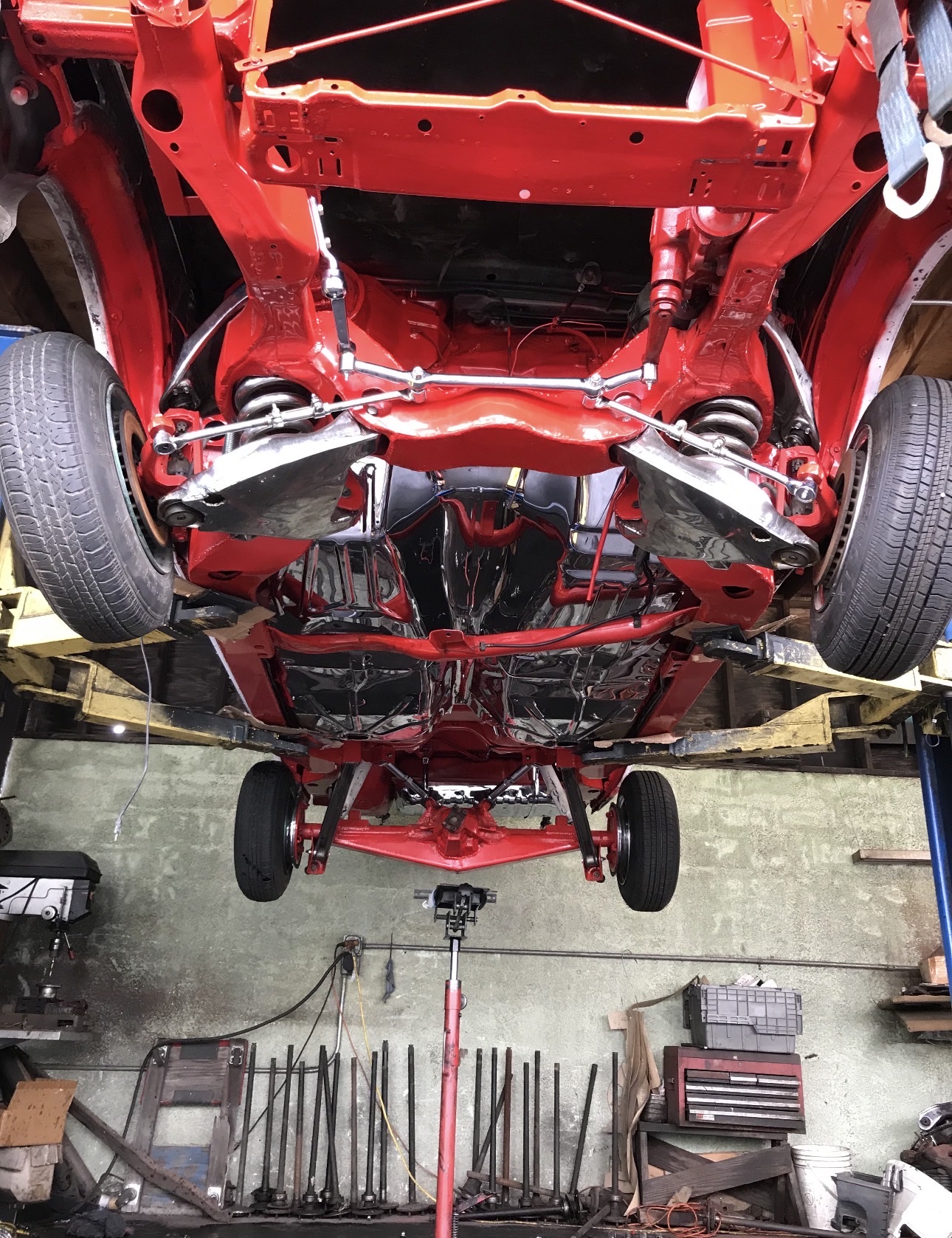 Red lowrider frame and suspension work