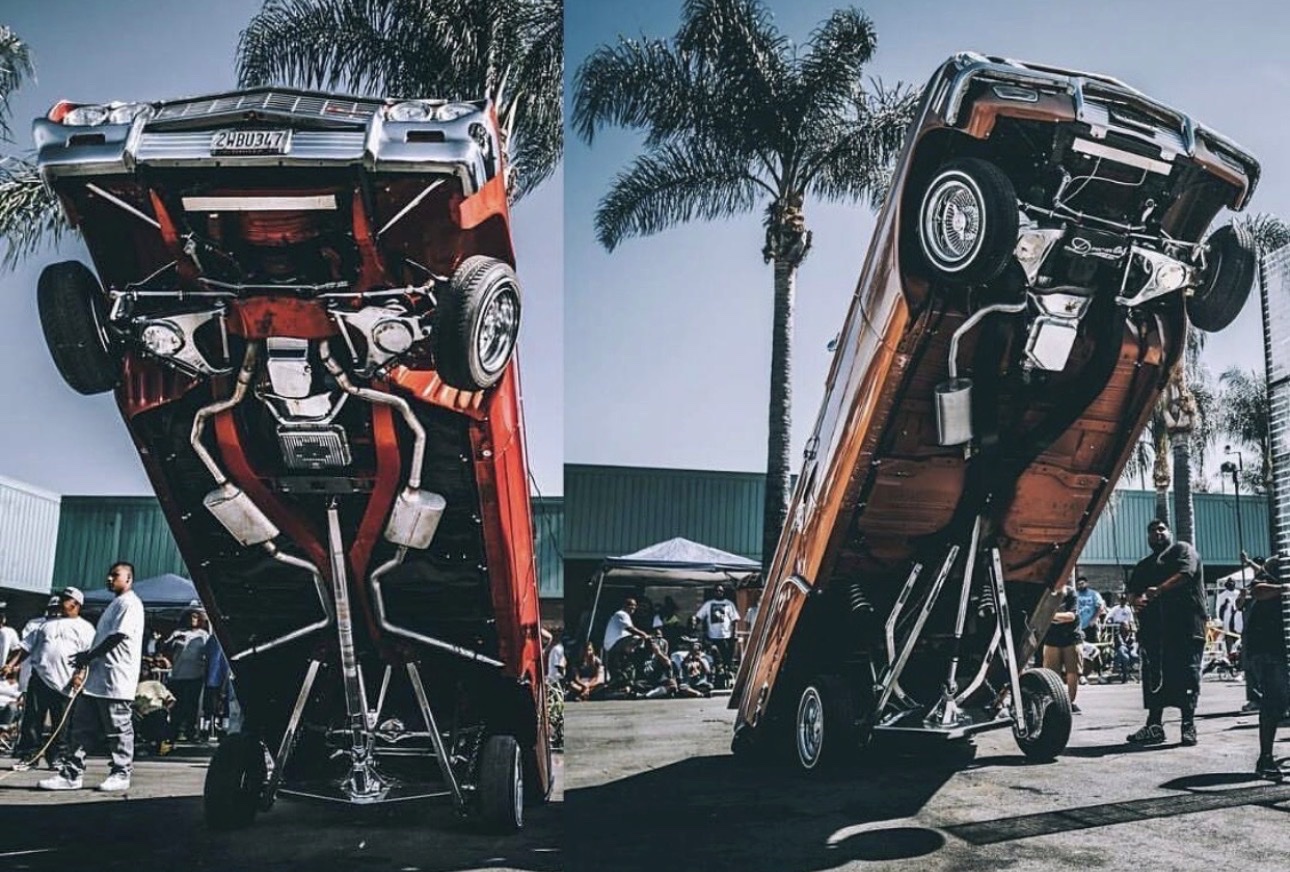 Two lowrider hoppers standing at a show
